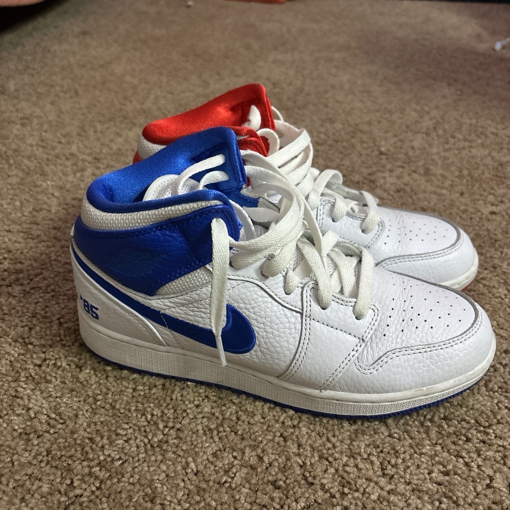 Kids White,Blue, and Red Air Jordan Sneakers